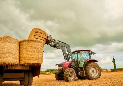 stacking-those-hay-bales-shot-of-a-farmer-stackin-2026-01-09-10-01-20-utc